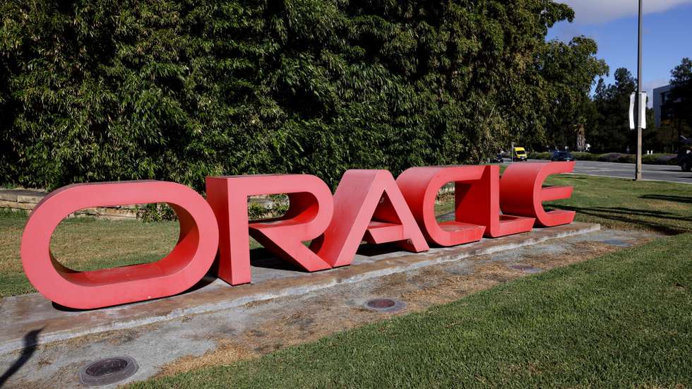epa12368656 Oracle signage is displayed at the entrance to the former headquarters and current offices of Oracle in Redwood City, California, USA, 10 September 2025. Oracle’s co-founder, and chairman Larry Ellison, briefly soared past Elon Musk as the world’s richest person for the first time as shares in Oracle surge more than 40 percent on Wednesday. Media reports that Oracle has shed more than 3,000 jobs globaly in recent weeks. Salesforce, Oracle and Google are laying off employees as part of a restructurings and shift particularly towards artificial intelligence.  EPA/JOHN G. MABANGLO