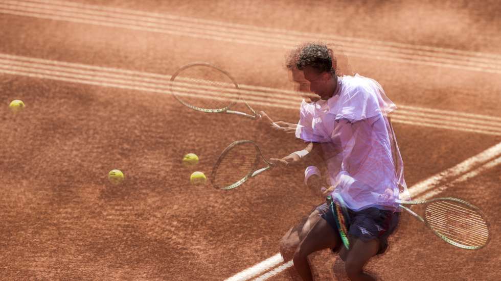 epa13130779 A multi-exposure photo of Luca Van Assche of France in action against Andrey Rublev of Russia during their quarterfinal match of the Estoril Open Tennis tournament in Estoril, Portugal, 24 July 2026.  EPA/JOSE SENA GOULAO