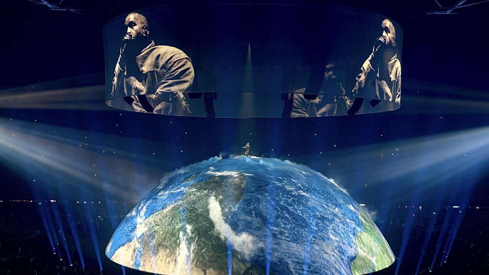 epa13021247 US rapper Ye performs during a concert at GelreDome in Arnhem, the Netherlands, 06 June 2026. Ye, also known as Kanye West, has faced cancellations and bans in several countries over past antisemitic and pro-Nazi statements.  EPA/RAMON VAN FLYMEN