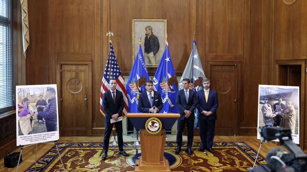epa13164721 US Attorney General Todd Blanche (C), with US Attorney Jamie McDonald (2-R) for the Southern District of New York and Matthew Millhollin (L), Acting Deputy Executive Associate Director Homeland Security Investigations, addresses a press conference at the Department of Justice in Washington, DC, USA, 12 August 2026. The Justice Department announced federal indictments against 11 individuals for orchestrating a Chinese national fraud marriage scheme that saw over 1,000 sham marriages that subvert US immigration laws.  EPA/WILL OLIVER