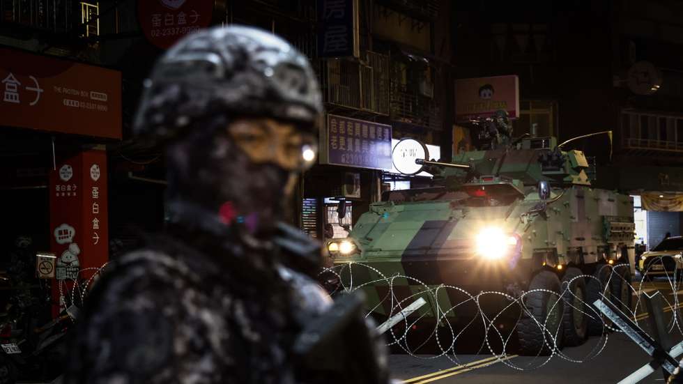 epa13164627 Taiwan Military armored vehicle maneuvers during a drill as part of the annual Han Kuang military exercises in Taipei, Taiwan, 13 August 2026. Taiwan’s Han Kuang exercises test combat readiness against a potential Chinese invasion.  EPA/RITCHIE B. TONGO