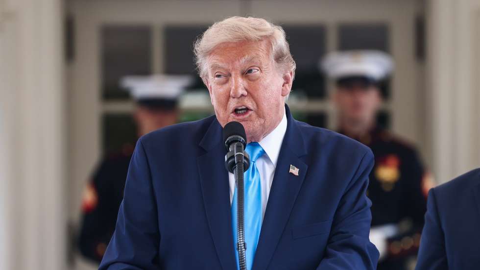 epa13142372 US President Donald Trump announces a program to allow veterans to expedite a career in commercial trucking outside the White House in Washington, DC, USA, 30 July 2026. Known as the Freedom Haulers program, the initiative would allow any US veteran who drove heavy equipment to be automatically eligible for a commercial trucking license.  EPA/JIM LO SCALZO / POOL
