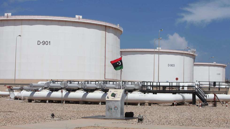 epa03833857 The oil storage tanks at Zawiya Oil Refinery some 40 kms west of Tripoli, Libya, 22 August 2013. The oil port of Zawiya has remained open while others ports in Libya were closed due to labour disputes.  EPA/SABRI ELMHEDWI