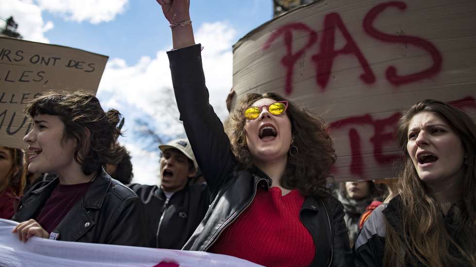 epa06659590 French university students take part in a demonstration to protest against education reforms near the Sorbonne university in Paris, France, 10 April 2018. Students across France have engaged in protest action and university blocades to protest against a reform which would make student university enrollment more selective. The student protests alo merge with larger nationwide protests in the public sector led by railway workers from France's SNCF rail network, labor unions, and Air France employees, who have taken to the streets and conducted strike action over government labor reforms.  EPA/IAN LANGSDON