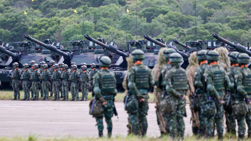 epa12494557 Taiwanese soldiers stand guard next to USA-made M1A2T ABRAMS tanks during the launching ceremony for the M1A2T Tank Battalion, in Hukou Township, Hsinchu County, Taiwan, 31 October 2025. Taiwan President Lai said in his speech that creating the new unit is a key milestone for the National Army’s shift to 'new training, new thinking, new equipment, and new technology.' With updated training and approaches, the principles of asymmetric warfare will be applied to strengthen combat effectiveness and carry out the broader 'defense and deterrence' strategy.  EPA/RITCHIE B. TONGO