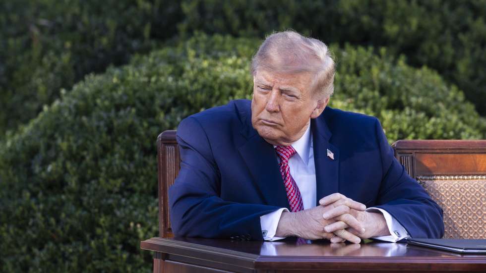 epa13315690 US President Donald Trump listens to First Lady Melania Trump speak ahead of signing an executive order to establish the Women's Health Division and a White House Women's Health Task Force in the Rose Garden of the White House in Washington, DC, USA, 19 October 2026. The first lady spoke about the need for overhauling women's health, including using AI for new research.  EPA/JIM LO SCALZO