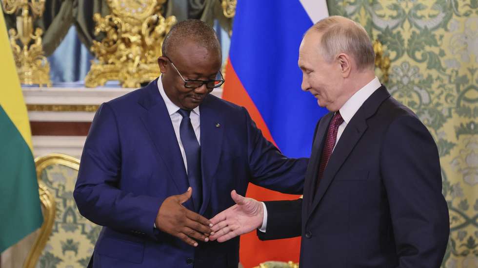 epa11925628 Russian president Vladimir Putin (R) shakes hands with Guinea-Bissau's President Umaro Sissoco Embalo during their meeting at the Kremlin in Moscow, Russia, 26 February 2025. The president of Guinea-Bissau is on a state visit to Russia.  EPA/YURI KOCHETKOV