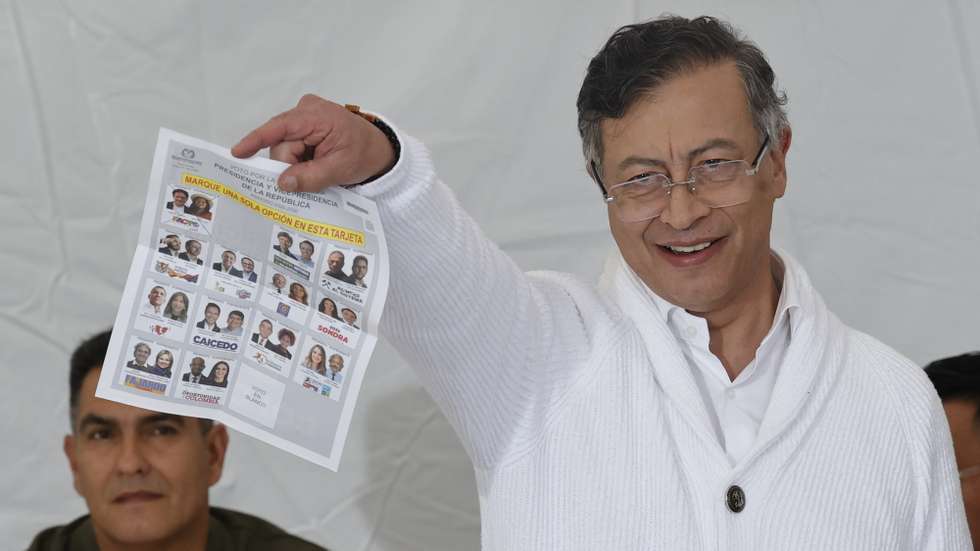 epa13006679 Colombian President Gustavo Petro shows his ballot for the first round of the country's presidential election in Bogota, Colombia, 31 May 2026. Petro voted in the first round of the election to choose his successor for the 2026-2030 term, which begins on 07 August 2026.  EPA/Mauricio Duenas Castaneda