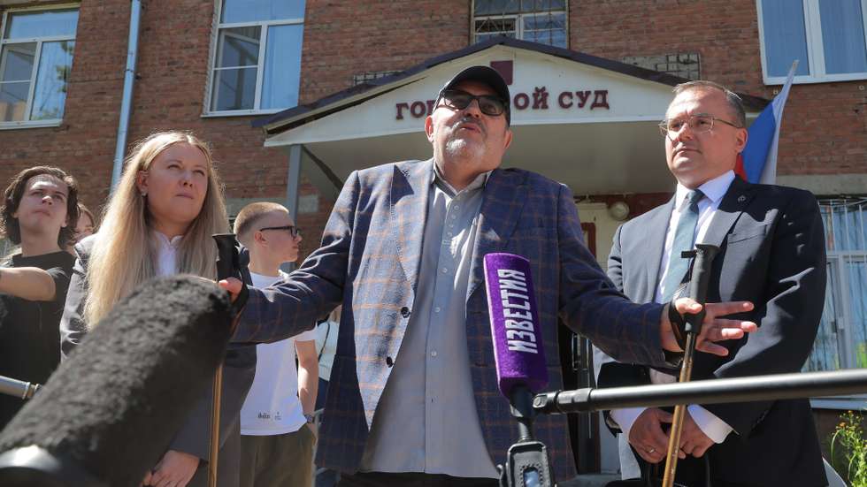 epa13117072 Russian opposition politician and former member of the State Duma Boris Nadezhdin (C) speaks to media after a court hearing on charges of displaying 'extremist' symbols, at the Dolgoprudny City Court in Dolgoprudny, Moscow region, Russia, 17 July 2026. Nadezhdin was designated as a 'foreign agent' on 10 July 2026, and was briefly detained by police on 13 July. The Russian Ministry of Justice accuses him of the creation and distribution of materials by foreign agents and 'undesirable' organizations, the dissemination of false information about government decisions and the Russian electoral system, and calling for participation in unauthorized rallies and pickets.  EPA/MAXIM SHIPENKOV
