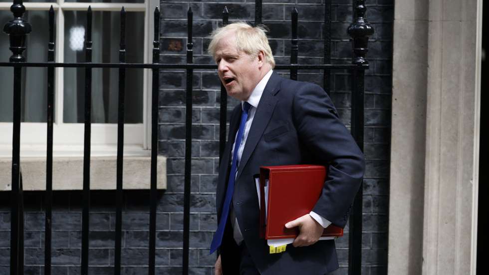epa10054673 British Prime Minister Boris Johnson leaves 10 Downing Street prior to attending a Prime Minister's Questions (PMQs) session at the Houses of Parliament, in London, Britain, 06 July 2022. British Prime Minister Boris Johnson is facing questions about the future of his premiership following the resignation of two senior government ministers, the Chancellor of the Exchequer and the Health Secretary.  EPA/TOLGA AKMEN