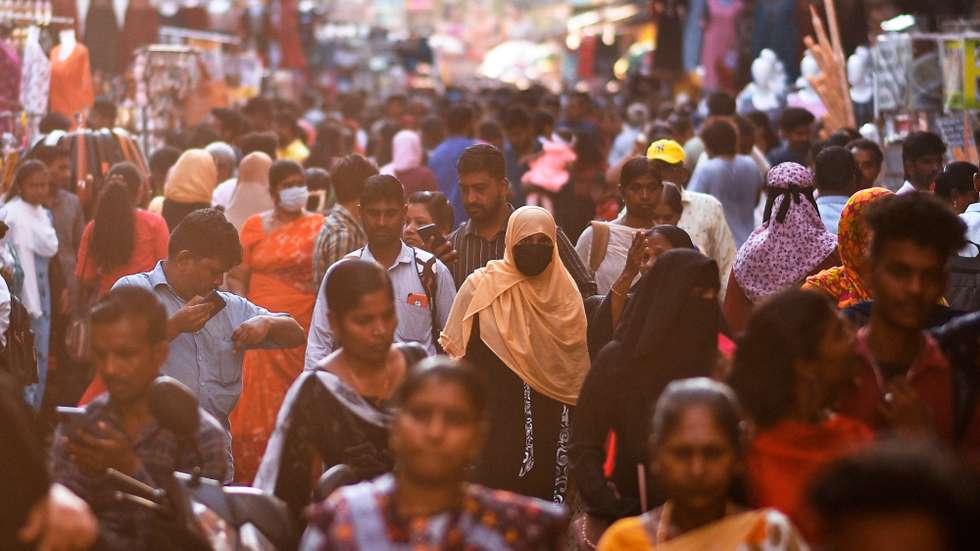 epa10573512 People arrive to shop at the crowded Ranganathan street, in Chennai, India, 13 April 2023 (issued 15 April 2023). The worldâ€™s population has reached 8 billion on 15 November 2022, with China and India, both with over one billion people, being the two most populous countries. The United Nations Population Fund has projected India will surpass China as the world's most populous country in 2023, with about 1,429 people, while Chinaâ€™s population has been decreasing and UN projections estimate it will be around 1,426 billion people by the end of 2023.  EPA/IDREES MOHAMMED