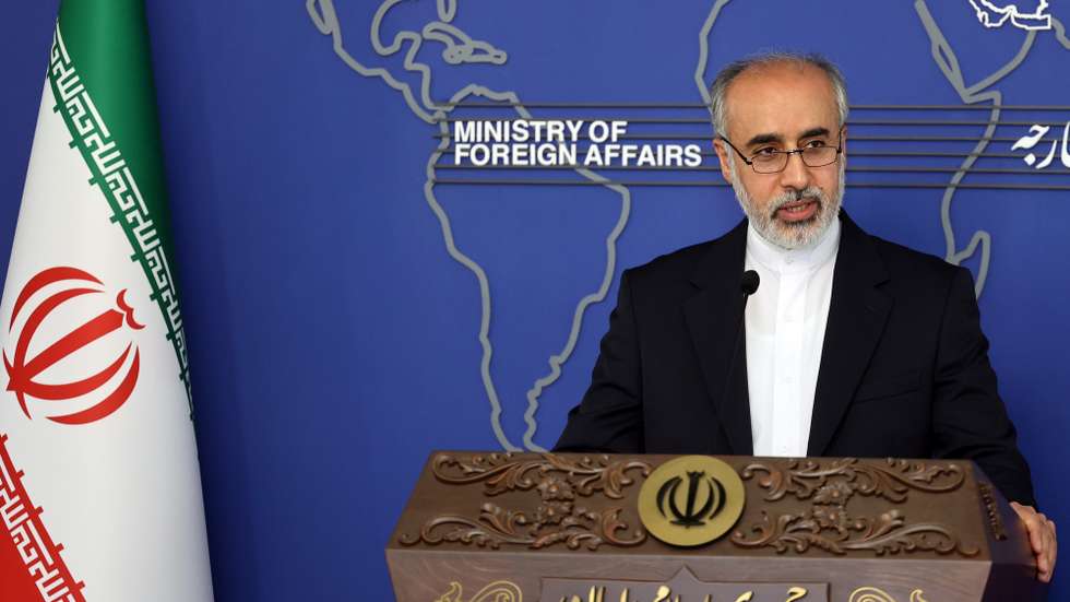 epa10068244 Iran's newly-appointed Foreign Ministry spokesman Nasser Kanani speaks during his first press conference in Tehran, Iran, 13 July 2022. According to Iranian foreign ministry, Kanani said that the nuclear talks are under way and the time and place for the next round will be announce soon.  EPA/AREF TAHERKENAREH