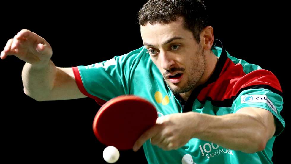 epa10647884 Marcos Freitas of Portugal in action in the Men's Singles round of 64 match against Tomokazu Harimoto of Japan at the 2023 ITTF World Table Tennis Championships in Durban, South Africa, 23 May 2023.  EPA/KIM LUDBROOK