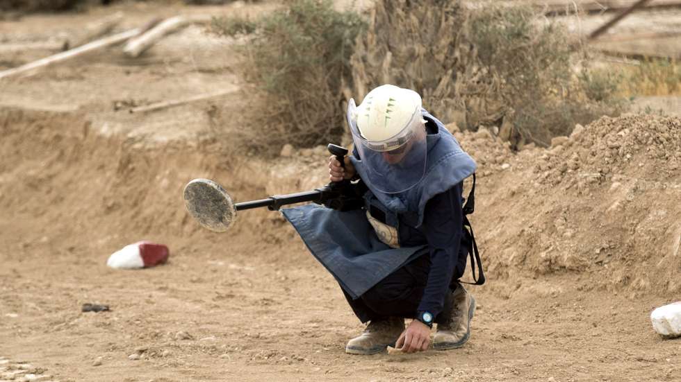 epa06635703 A sapper landmine clearance belonging to the HALO Trust works during demining efforts next to an abandoned church at Qasr al Yahud baptism site on the Jordan River, near the West Bank city of Jericho, 29 March 2018. Israel National Mine Action Authority (INMAA) under the Ministry of Defense, together with HALO Trust, an international mine clearance charity, have officially started to clear the Qasr al-Yahud Baptism Site of all residual mines and explosive remnants of the 1967 Six-Day War. The project will demine roughly one million square meters of land. Defense Ministry officials expect to find approximately three thousand targets, consisting of anti-personnel mines, anti-tank mines, and other explosive remnants of war. The site, is home to eight different church denominations. and access to the church plots and surroundings has been restricted since the 1970s.  EPA/ATEF SAFADI