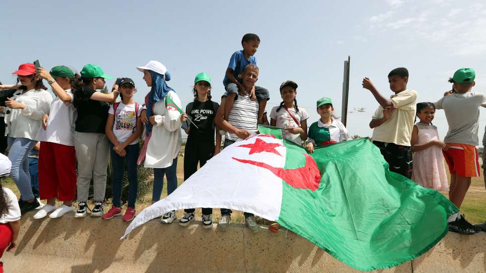 epa10053417 Algerians attend celebrations of the 60th anniversary of independence in Algiers, Algeria, 05 July 2022. Algeria celebrates, annually, on 05 July its independence from France.  EPA/MOHAMED MESSARA