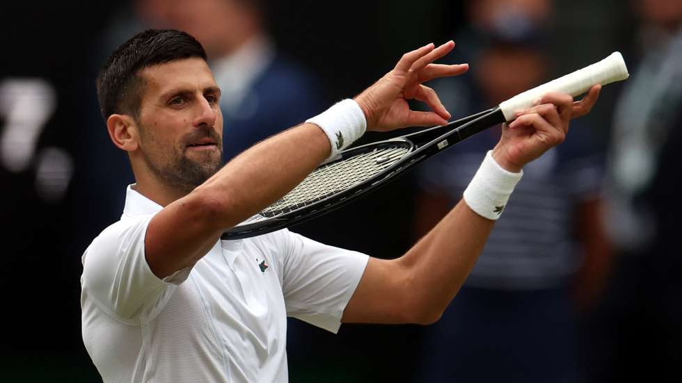 epa11474982 Novak Djokovic of Serbia reacts after winning the Men's semifinal match against Lorenzo Musetti of Italy at the Wimbledon Championships, Wimbledon, Britain, 12 July 2024.  EPA/NEIL HALL  EDITORIAL USE ONLY