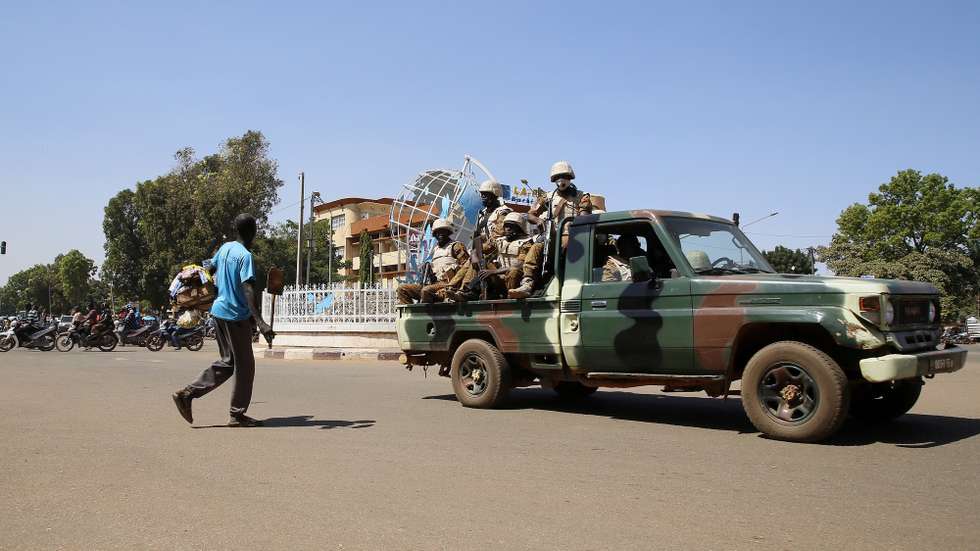 epa08832850 Soldiers patrol the United Nations Square in Ouagadougou, Burkina Faso, 21 November 2020.The first round of the Burkina Faso presidential elections will take place on 22 November 2020.  EPA/LEGNAN KOULA