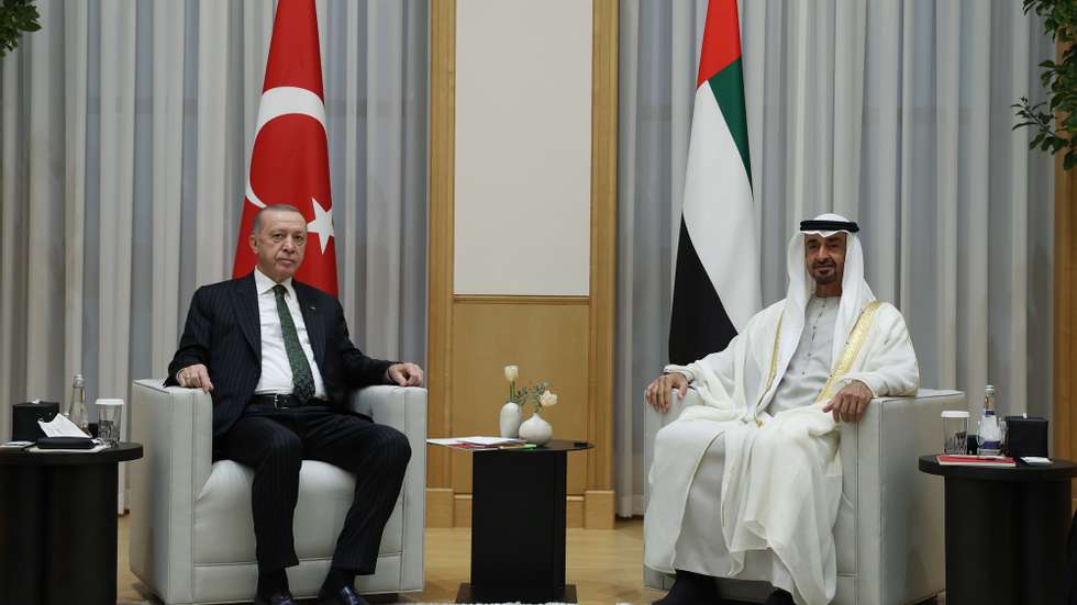 epa09756241 A handout photo made available by the Turkish President Press Office shows Abu Dhabi Crown Prince Sheikh Mohammed bin Zayed Al Nahyan (R) and Turkish President Recep Tayyip Erdogan (L) during their meeting at the Qasr Al Watan palace in Abu Dhabi, United Arab Emirates, 14 February 2022. Turkish President Erdogan&#039;s official visit to UEA, where he will also attend Dubai Expo, will be for two days.  EPA/TURKISH PRESIDENT PRESS OFFICE HANDOUT  HANDOUT EDITORIAL USE ONLY/NO SALES