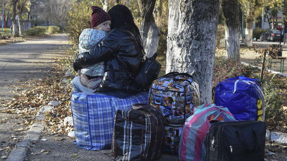 epa10305698 People evacuated from Kherson region arrive at the temporary accommodation centre in Dzhankoi, Crimea, 14 November 2022. According to the commander of the Joint Group of Forces in the zone of the so-called ‘Special Military Operation’, Sergei Surovikin, more than 115,000 people were evacuated from the right bank of the Dnieper river. On 11 November the Russian Ministry of Defense announced the completion of the withdrawal of military personnel and equipment to the left bank.  EPA/STRINGER