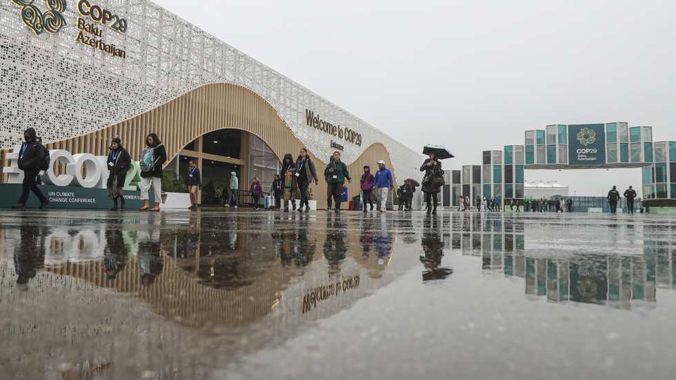 epa11726924 Participants arrive to the venue of the UN Climate Change Conference COP29 in Baku, Azerbaijan, 18 November 2024. The Azerbaijani capital of Baku hosts the 2024 United Nations Climate Change Conference (COP29) from 11 to 22 November 2024.  EPA/IGOR KOVALENKO