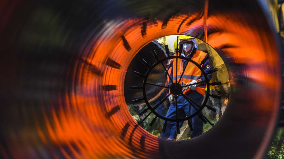 epa08457564 A worker wearing a face mask works at the construction site of the Balkan Stream gas pipeline near the village of Kamenovo, Bulgaria, 01 June 2020. Bulgarian Prime Minister Boyko Borisov invited Serbian President Aleksandar Vucic to visit Bulgaria and inspect the progress made in the construction works of their two joint projects, Europe Motorway and the Balkan Stream. These projects are crucial for infrastructure and energy cooperation between the neighboring nations.  EPA/VASSIL DONEV
