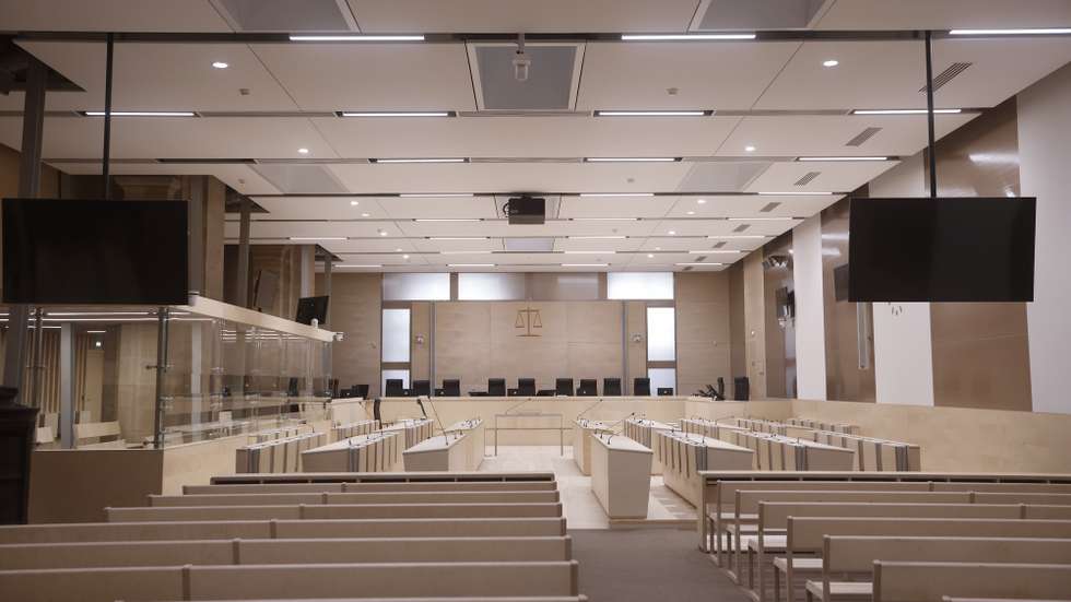 epa09442661 An interior view of the temporary courtroom prepared for trial over 2015 terrorist attacks at the courthouse in Paris, France, 02 September 2021. The trial over the 13 November 2015 terrorist attacks is due to start on 08 September 2021 and will last nine months. The attacks killed 130 people with hundreds injured which targeted the Bataclan concert hall, the Stade de France national sports stadium, and several restaurants and bars.  EPA/YOAN VALAT