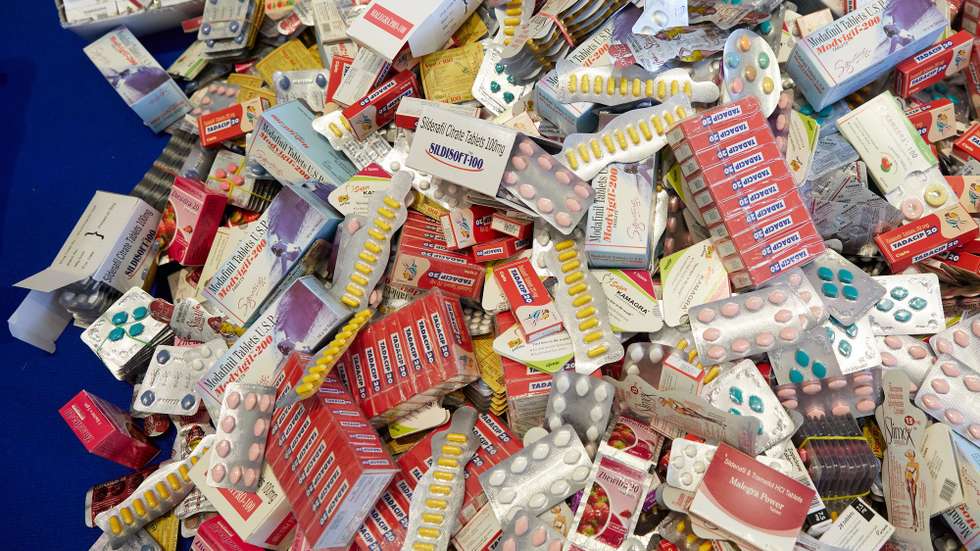 epa06674408 Confiscated medicines are presented during the Customs Report 2017 in Berlin, Germany, 17 April 2018. In 2016, customs had withdrawn fake goods worth 180 million euro and 120 million cigarettes. In addition, staff for the fight against money laundering and terror financing had been significantly strengthened in 2017.  EPA/HAYOUNG JEON