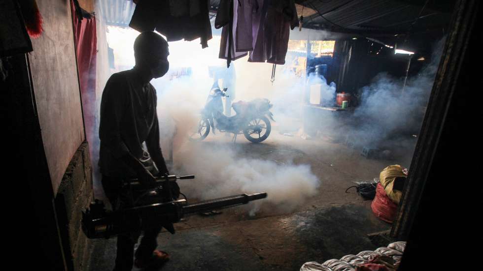 epa05785555 An East Timor's health worker sprays a residential area to prevent dengue fever infections in Dili, East Timor, also known as Timor Leste, 11 February 2017. According to World Health Organization (WHO) The disease is now endemic in more than 100 countries in Africa, the Americas, the Eastern Mediterranean, South-east Asia and the Western Pacific.  EPA/ANTONIO DASIPARU