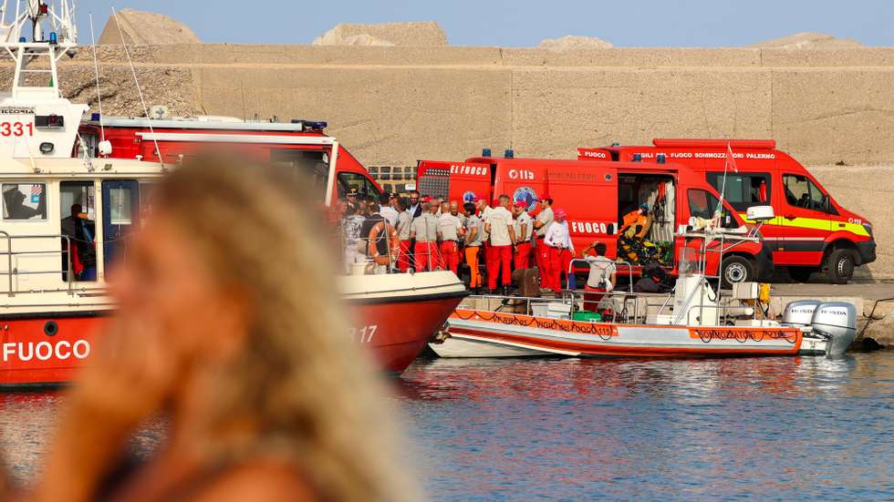 epa11555178 Experienced cave divers for deep sea recoveries arrive at the pier as a rescue operation continues for the missing people who were on board a sailboat that sank, in Palermo, Sicily, Italy, 19 August 2024. At least one person died, six remain missing and 15 passengers were rescued, after a 56-meter-long luxury sailboat, the Bayesian, with 22 people on board, sank at dawn on 19 August off Porticello, near Palermo, after a tornado hit the area.  EPA/IGOR PETYX