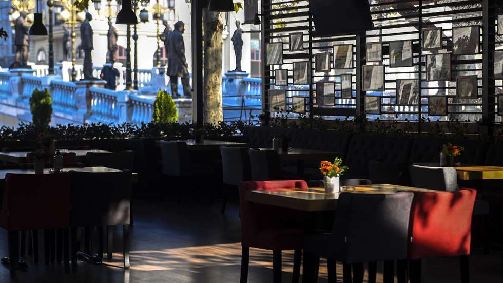 epa08809816 A general view of the empty restaurant during the sunny day in the center of the capital Skopje, Republic of North Macedonia, 09 November 2020. Despite the nice weather for this time of the year, the fear of a large number of newly infected people with COVID-19, emptied the restaurants and streets in the city.  EPA/GEORGI LICOVSKI