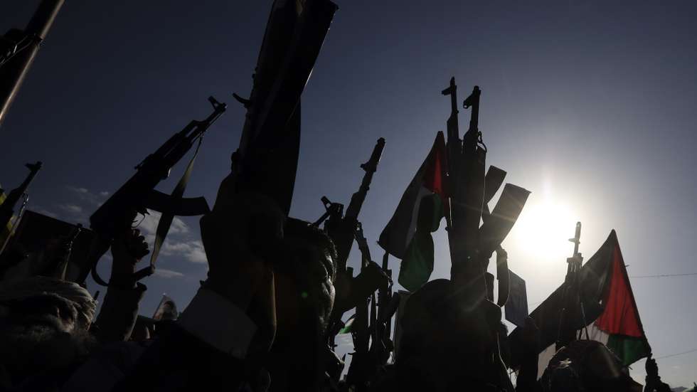 epa11647890 Demonstrators hold up their weapons during an anti-Israel rally in support of the Palestinian people, in Sana'a, Yemen, 07 October 2024. The day 07 October 2024, marks one year since the Palestinian militant group Hamas launched a surprise attack on Israel, killing 1,200 and abducting over 250, and one year since Israel began its war on Gaza, killing more than 41,000 and destroying the Palestinian enclave.  EPA/YAHYA ARHAB