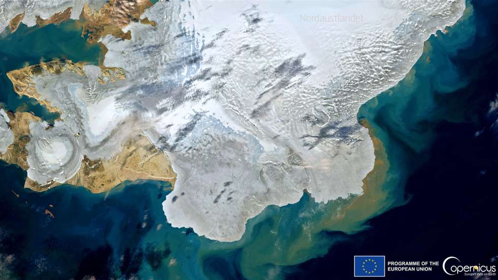 epa10101122 A handout satellite image made available by Copernicus, the European Union's Earth Observation Programme, acquired by one of the Copernicus Sentinel-2 satellites on 31 July 2022, shows a large sediment discharge in the Arctic Sea, off the coast of Svalbard, caused by the rapid melting of snow and ice (issued 01 August 2022). According to an accompanying press release, the recorded temperatures in Norwayâ€™s Svalbard archipelago are about five degrees Celsius higher than the 01 August reference values (i.e., in respect to the 1981-2010 average for the same day). This heatwave is causing exceptional levels of ice cap melting, thus contributing to sea level rise.  EPA/EUROPEAN UNION, COPERNICUS SENTI -- MANDATORY CREDIT: EUROPEAN UNION, COPERNICUS SENTINEL-2 IMAGERY -- HANDOUT EDITORIAL USE ONLY/NO SALES