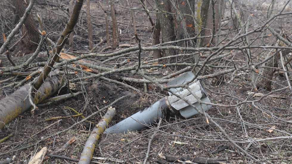 epa09862823 A part of a rocket is seen near the Teteriv village not far from Kyiv (Kiev), Ukraine, 31 March 2022. Russian troops entered Ukraine on 24 February resulting in fighting and destruction in the country, and triggering a series of severe economic sanctions on Russia by Western countries.  EPA/STR