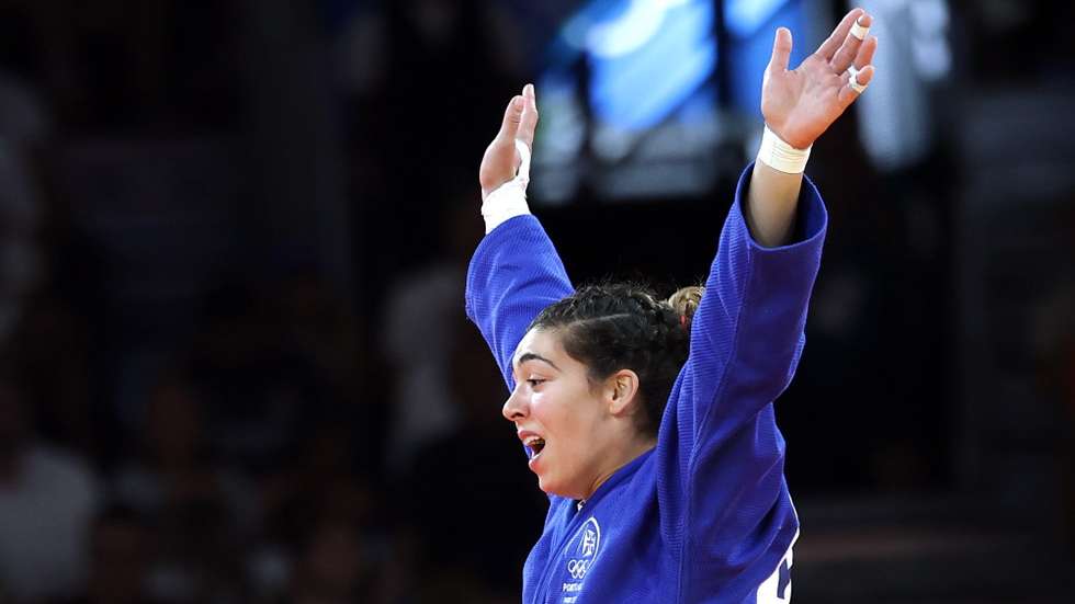 epa11516240 Patricia Sampaio of Portugal celebrates winning against Rika Takayama of Japan the Women -78kg bronze medal bout of the Judo competitions in the Paris 2024 Olympic Games, at the Champs-de-Mars Arena in Paris, France, 01 August 2024.  EPA/CHRISTOPHE PETIT TESSON