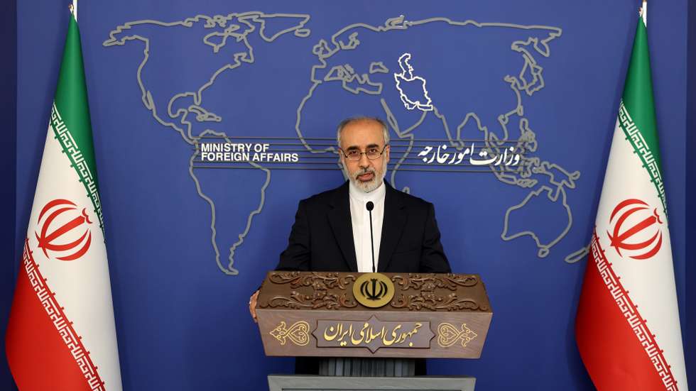 epa10068245 Iran&#039;s newly-appointed Foreign Ministry spokesman Nasser Kanani speaks during his first press conference in Tehran, Iran, 13 July 2022. According to Iranian foreign ministry, Kanani said that the nuclear talks are under way and the time and place for the next round will be announce soon.  EPA/AREF TAHERKENAREH