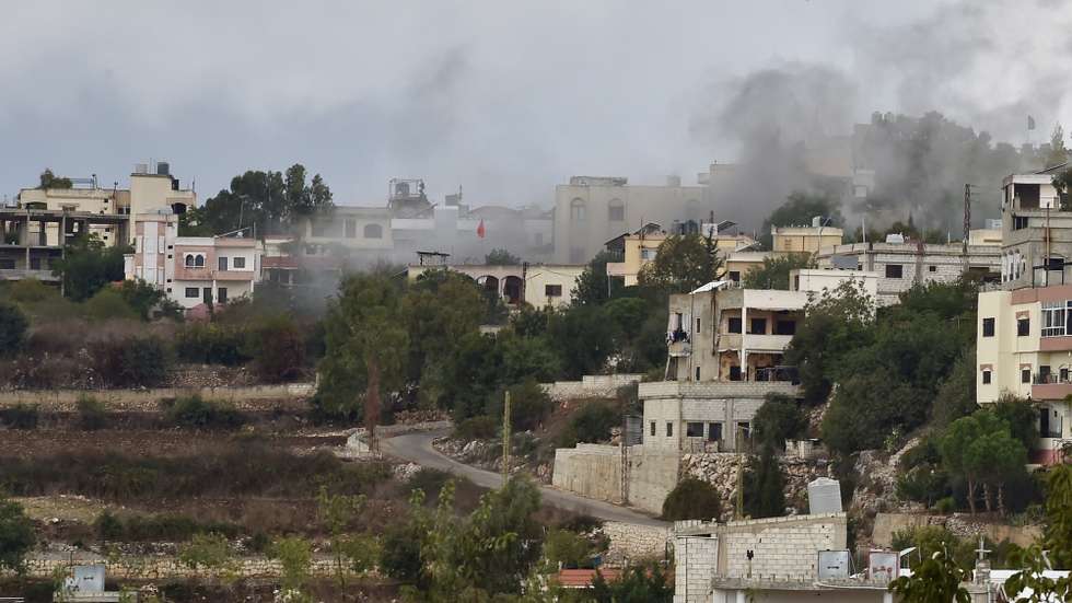 epa10920060 Smoke rises after Israeli army shelling on Ayta ash-Shab village, near the Lebanese-Israeli border, Lebanon, 15 October 2023. According to the Israeli Defense Forces (IDF), anti-tank missiles were fired at soldiers operating along the Lebanese border, and Israeli forces responded by striking Hezbollah military targets.  EPA/WAEL HAMZEH