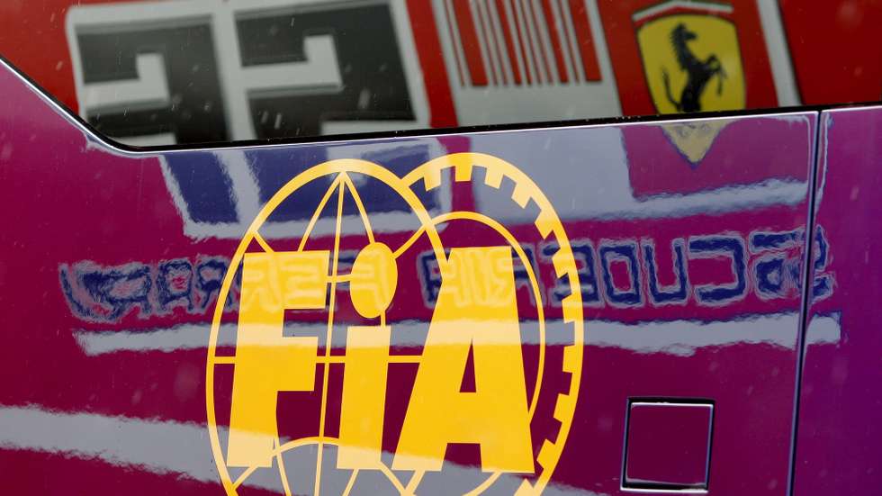 epa01750793 The logo of Scuderia Ferrari is mirrored in a FIA truck in the paddock at Istanbul Otodrom Circuit in Istanbul, Turkey, 04 June 2009. The Grand Prix of Turkey will take place on 07 June 2009.  EPA/KERIM OKTEN