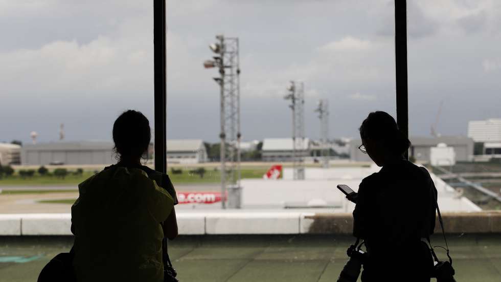 epa11435799 Members of the media wait in an observation area for the plane carrying WikiLeaks founder Julian Assange to arrive at the Don Mueang International Airport in Bangkok, Thailand, 25 June 2024. According to court filings in the US district court for the Northern Mariana Islands, US prosecutors said they anticipate Assange will plead guilty to the criminal count of conspiring to obtain and disclose classified documents relating to the national defence of the United States. A statement posted by WikiLeaks on the social media platform 'X' said Assange was freed from Belmarsh maximum security prison in the United Kingdom on the morning of 24 June, after having spent 1,901 days there. He was granted bail by the High Court in London and was released at Stansted Airport during the afternoon. He then boarded a plane and departed the UK to return to Australia. His wife Stella confirmed on X that ‘Julian is free’ and thanked supporters.  EPA/RUNGROJ YONGRIT