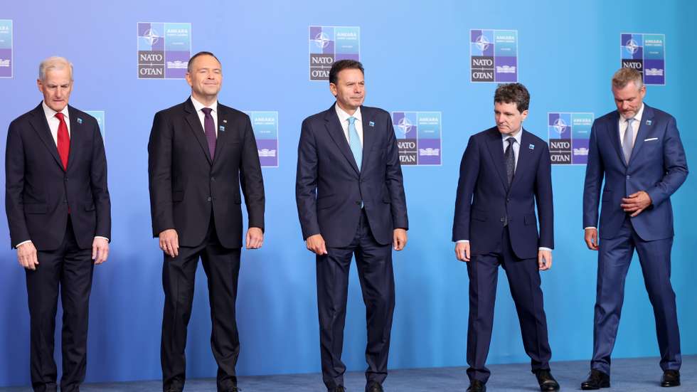 epa13097830 (L-R) Canadian Prime Minister Mark Carney, Poland President Karol Nawrocki,  Portugal Prime Minister Luis Montenegro, Romanian President Nicusor Dan, and Slovakia President Peter Pellegrini prepare for a group photo during the 2026 NATO Summit in Ankara, Turkey, 08 July 2026. The NATO Summit takes place from 07-08 July.  EPA/GEORGI LICOVSKI