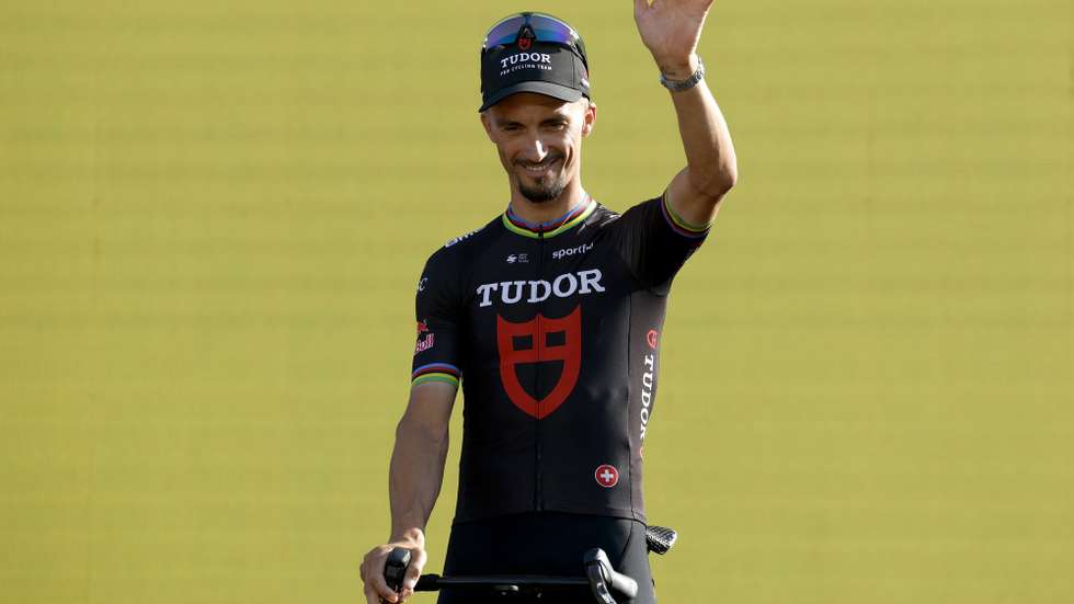 epa13080745 French cyclist Julian Alaphilippe of Tudor Pro Cycling Team waves during the teams' presentation of the Tour de France 2026 in front of the Basilica of the Sagrada Familia in Barcelona, Spain, 02 July 2026. The 113th edition of the race is scheduled to take place from 04 to 26 July 2026.  EPA/GUILLAUME HORCAJUELO