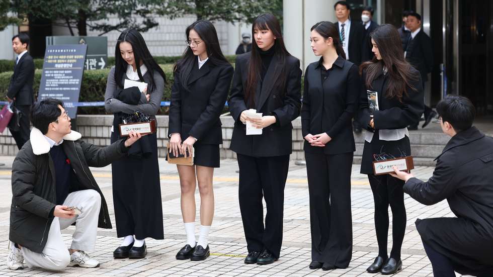 epa11946250 K-pop girl group NewJeans meets the press at the Central District Court in Seoul, South Korea, 07 March 2025, after attending a hearing to review an injunction that the group's agency, ADOR, has filed to prevent the group's five members from independently signing advertising contracts amid an ongoing dispute over their exclusive contracts with the agency.  EPA/YONHAP SOUTH KOREA OUT