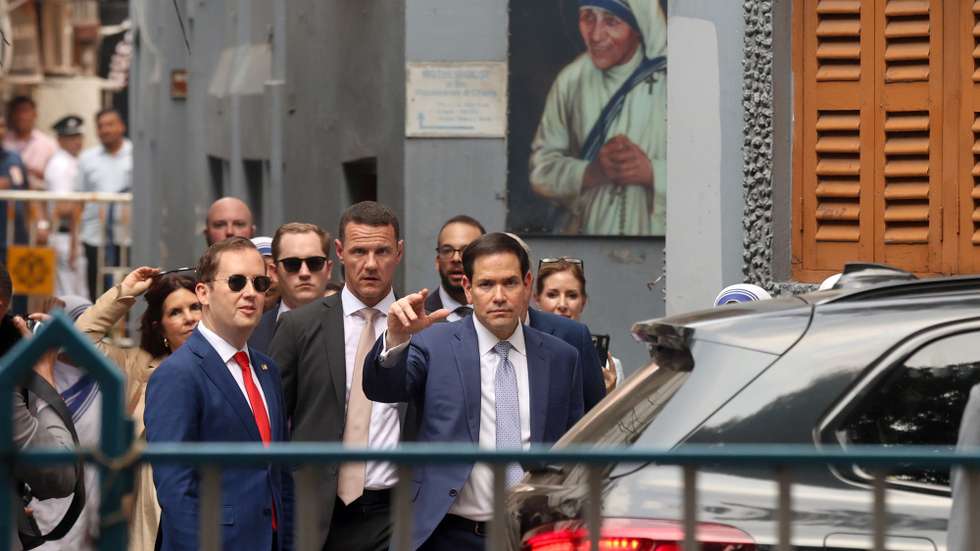 epa12985889 US Secretary of State Marco Rubio waves to the media near Mother House in Kolkata, India, 23 May 2026. Rubio arrived in Kolkata on the opening leg of a four-day official visit to India, where he will tour several cities and attend the Quadrilateral Security Dialogue (Quad) Foreign Ministers' meeting in New Delhi.  EPA/PIYAL ADHIKARY