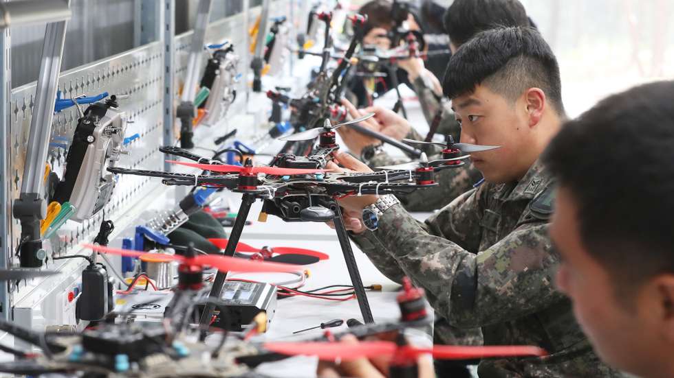 epa07574585 Soldiers assemble and maintain military drones at the Army Intelligence School's drone education center in Icheon, 80 kilometers east of Seoul, South Korea, 16 May 2019.  EPA/YONHAP SOUTH KOREA OUT