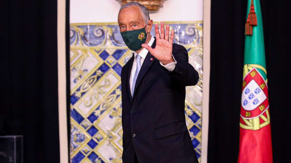 Portugal's President Marcelo Rebelo de Sousa waves after received from the Secretary General of the Presidency of the Republic (L) the Band of the Three Orders, symbol of the President of the Republic and Grand Master of the Portuguese Honorific Orders as he arrives to Belem Palace, after his swearing ceremony for a second term as President of the Republic, in Lisbon, Portugal, 09 March 2021. Reelected in the January 24 presidential elections with 60.67% of the votes cast, the 72-year-old retired law professor, a former constituent deputy, will be sworn in on the original of the Constitution of the Portuguese Republic. ANDRE KOSTERS/LUSA