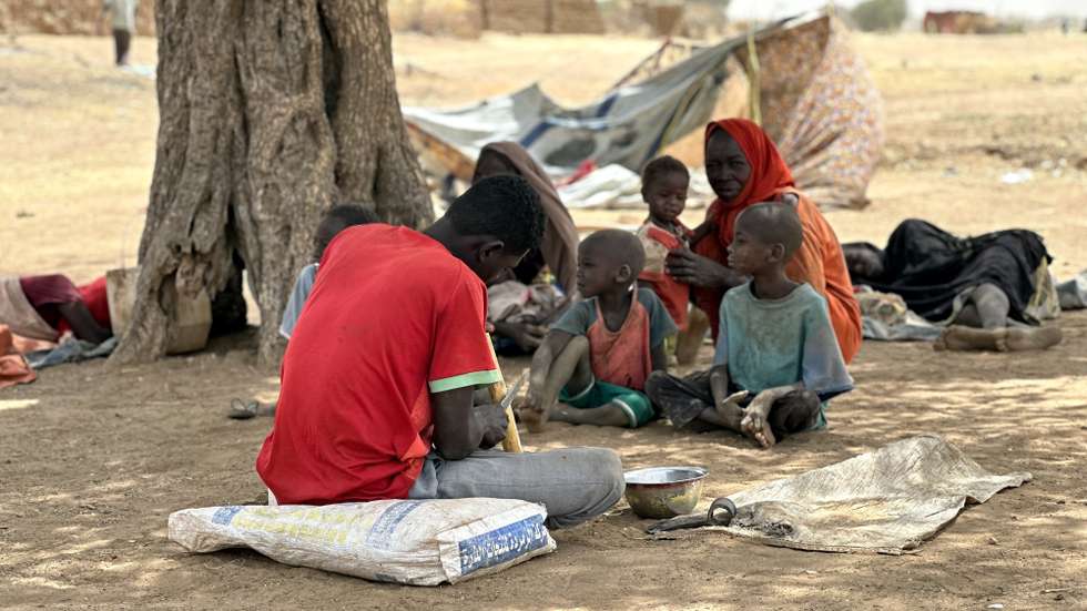 epa12049088 Sudanese people, who fled from the internally displaced persons (IDP) Zamzam camp, rest while on their way to the Tawila Camps amid the ongoing conflict between Sudan's army and the Rapid Support Forces (RSF), in North Darfur, Sudan, 23 April 2025. The RSF claimed control of the Zamzam camp after its assault in April 2025. According to the UNHCR, over four million people have fled Sudan to neighboring countries since the outbreak of the armed conflict in April 2023.  EPA/MARWAN MOHAMED