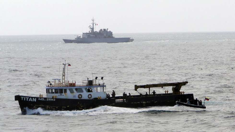 epa02589225 An undated handout photograph made availble on 18 February 2011 by the French Defence Ministry of the vessel Titan, boarded by Venezuelan and French Navies personnel off the Venezuelan cost in the Caribbean Sea, 14 February 2011. Authorities seized 3.6 metric tons of cocaine aboard the ship. Venezuelan Justice Minister Tareck El Aissami reportedly said seven suspects were arrested during the operation.  EPA/FRENCH DEFENCE MINISTRY/HANDOUT HANDOUT --- EDITORIAL USE ONLY EDITORIAL USE ONLY