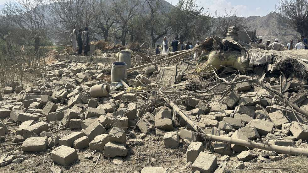 epa13253859 People inspect the damage at the site of an alleged Pakistani airstrike in Noorgul district of Kunar, Afghanistan, 21 September 2026. According to Taliban authorities, three people were killed and four others were injured in Kunar and Paktika provinces. Pakistan has not officially confirmed carrying out the strikes. Islamabad has repeatedly accused the Taliban authorities of allowing militant groups to operate from Afghan territory and carry out attacks in Pakistan, allegations Kabul denies.  EPA/STRINGER