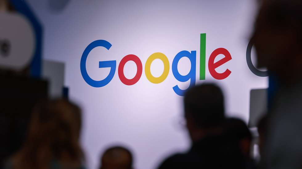 epa12037620 FILE People walk past the logo of Google during the Hanover Fair 2025 (Hannover Messe) in Hanover, Germany, 31 March 2025 (reissued 17 April 2025). A US judge has ruled that Google has a monopoly in online advertising technology, the second antitrust case Google has lost in a year, after it was ruled the company also had a monopoly on online search.  EPA/Hannibal Hanschke