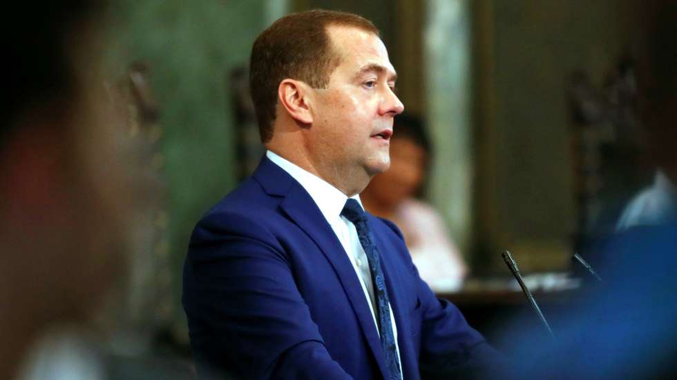 epa07895736 Russian Prime Minister Dmitri Medvedev delivers a speech during the ceremony where he has been invested with the title of Doctor Honoris Causa in Political Science, in Havana, Cuba, 04 October 2019. Medvedev is on his second day of an official visit to the island.  EPA/YANDER ZAMORA
