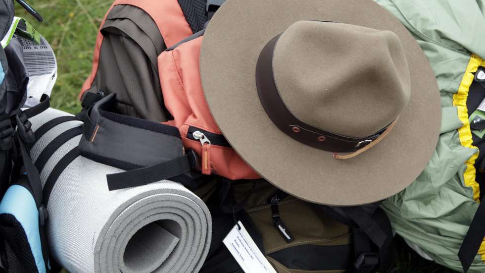 epa02843831 A hat and camping equipment lie on the ground at the camp of the World Scout Jamboree, in Rinkaby, some 20 km from Kristianstad in southern Sweden, on 27 July, 2011. Some 40,000 scouts from 150 countries are expected to take part in the 22nd World Scout Jamboree that takes place from 27 July to 7 August.  EPA/DRAGO PRVULOVIC SWEDEN OUT